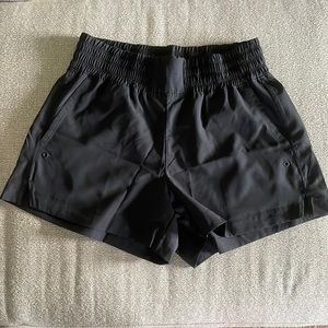 High-Waisted StretchTech Shorts for Women -- 4-inch inseam.